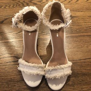 All Black heeled sandals.